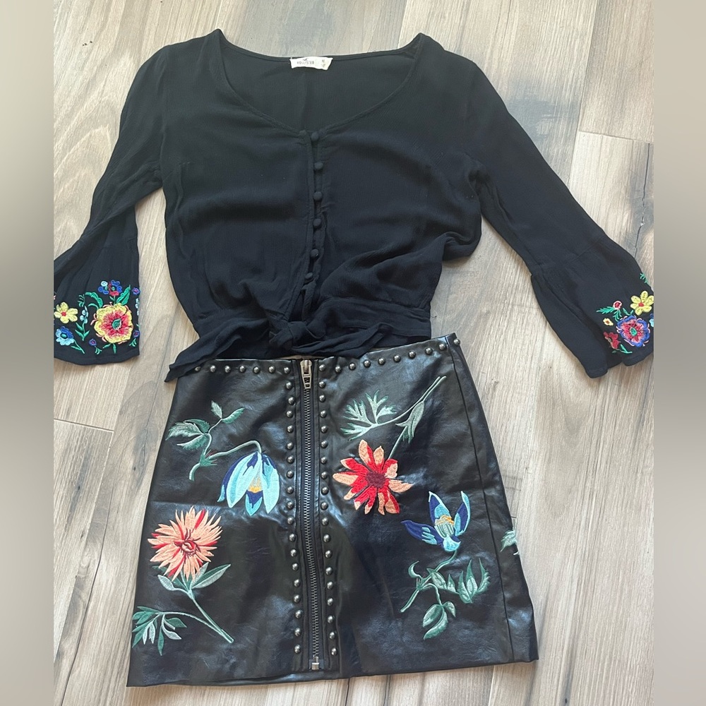 Leather skirt size small. Size medium top, both black with flower embroidery.